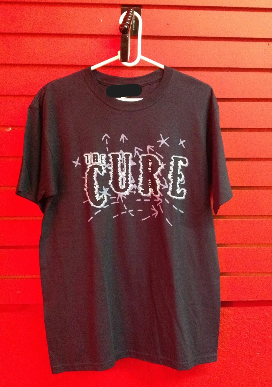 The Cure Logo On T Shirt